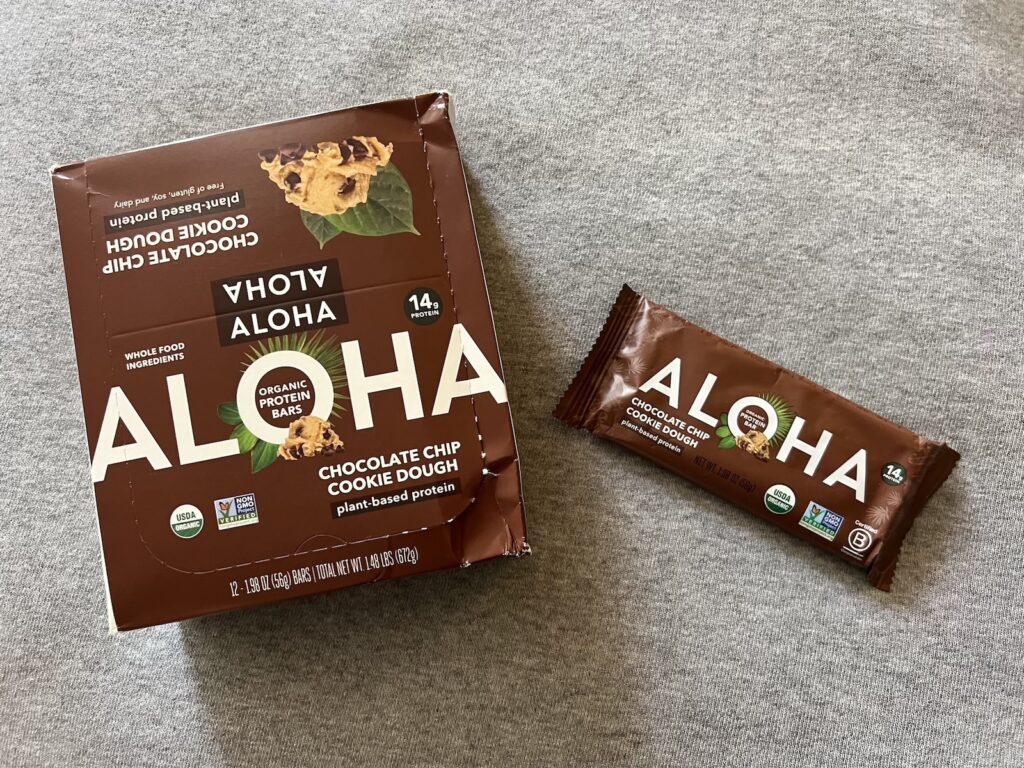 Aloha chocolate chip cookie dough protein bars - a box and a bar next to it