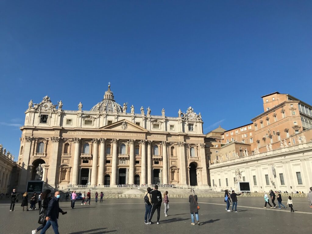 St. Peter’s Basilica in Vatican City under a blue sky (from my trip to Italy), where pilgrims attend Midnight Mass on Christmas Eve