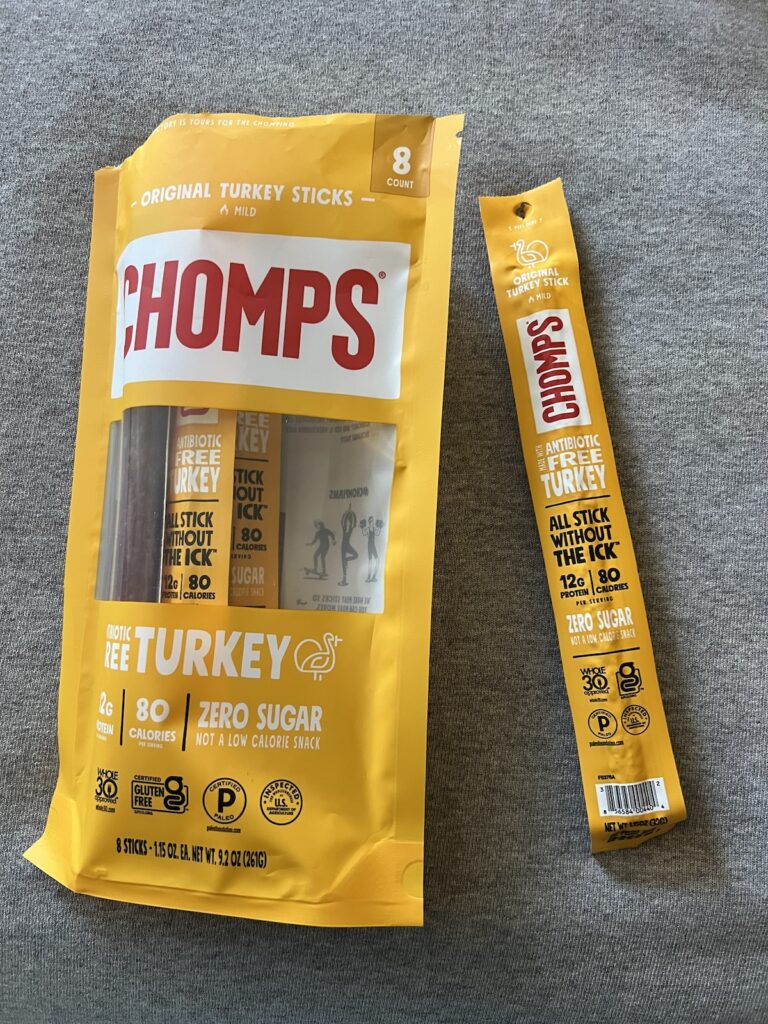Chomps turkey meat sticks laid out for travel snack prep.