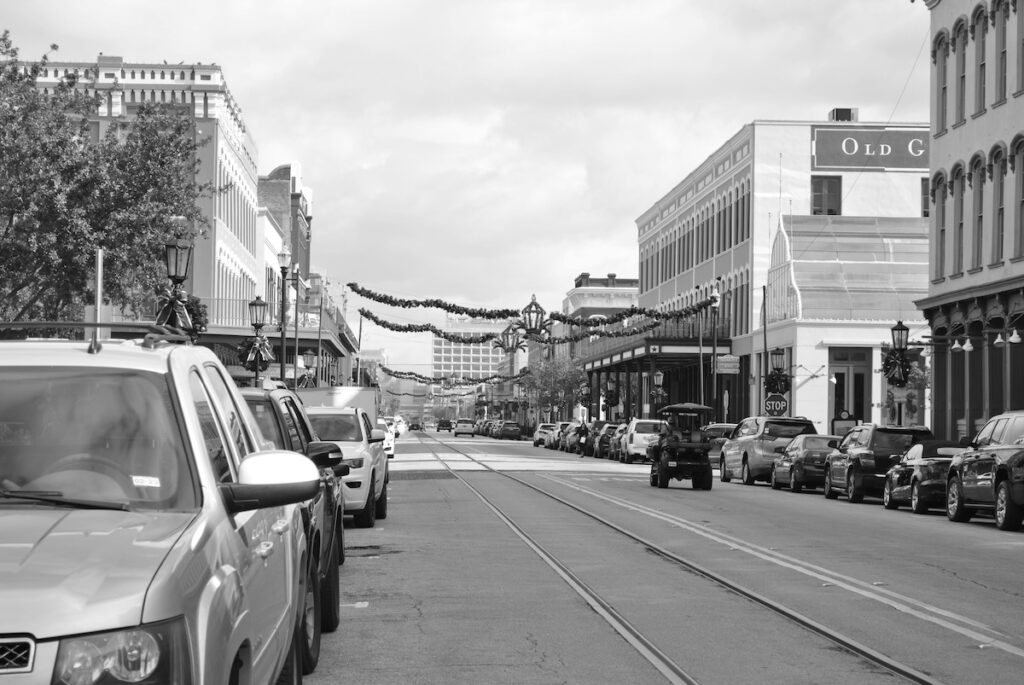 Christmas decorations on the street in Galveston, Texas in a black and white photo