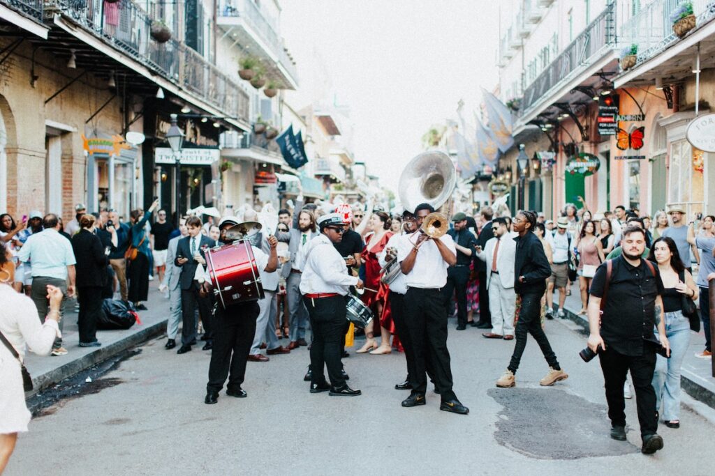 French Quarter in New Orleans with a band and crowds